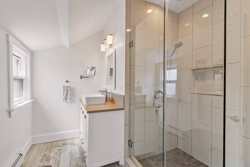 32 Maple Avenue Nahant, MA 01908 - Photo 30 of 37 a bathroom with a sink a toilet and shower