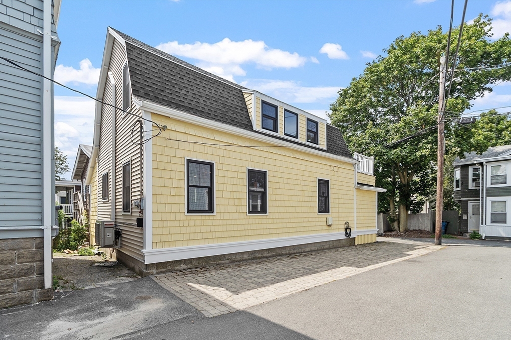 32 Maple Avenue Nahant, MA 01908 - Photo 36 of 37 a view of a house with a backyard