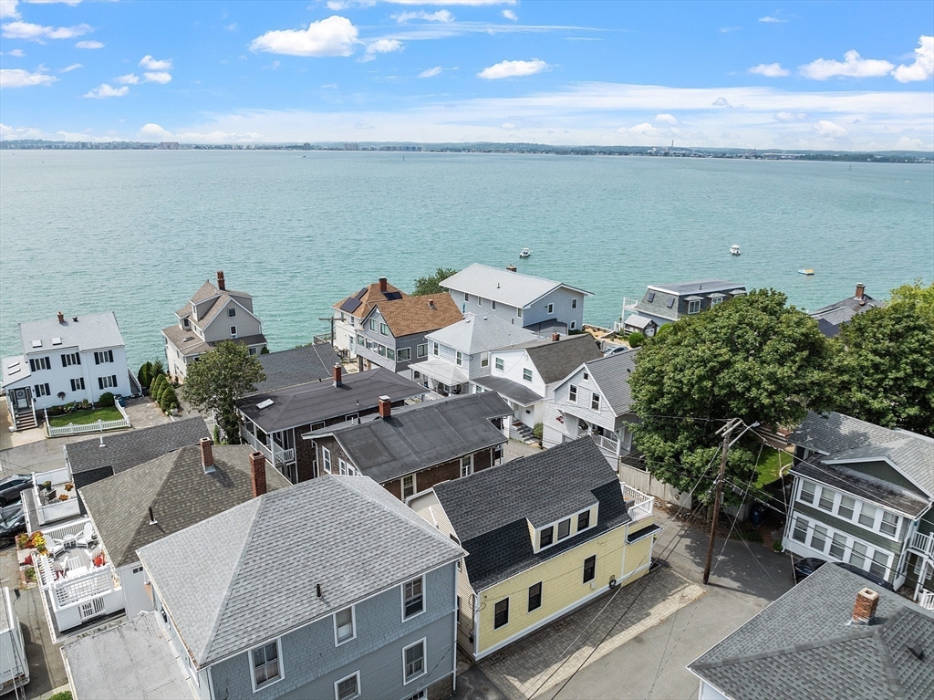 32 Maple Avenue Nahant, MA 01908 - Photo 6 of 37 a terrace of a house with outdoor seating