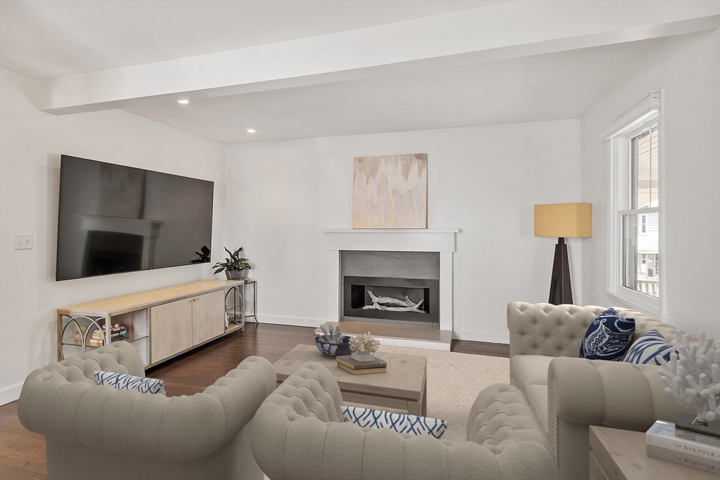 32 Maple Avenue Nahant, MA 01908 - Photo 7 of 37 a living room with furniture and a flat screen tv