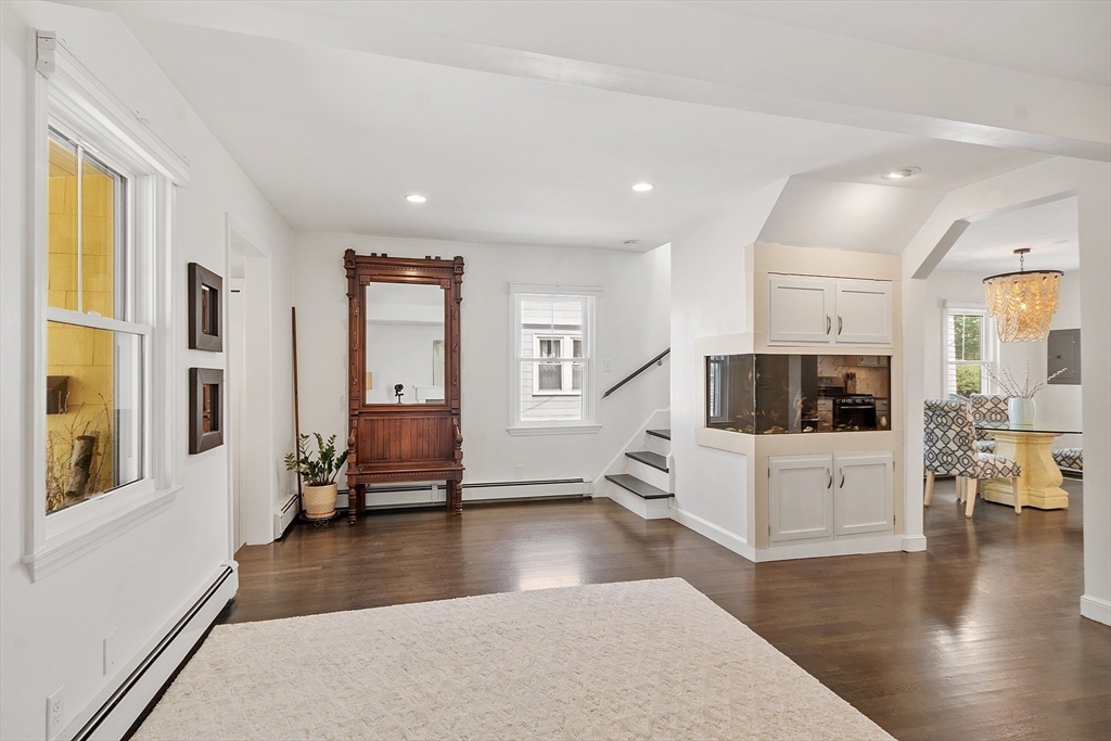 32 Maple Avenue Nahant, MA 01908 - Photo 9 of 37 a living room with furniture and a flat screen tv