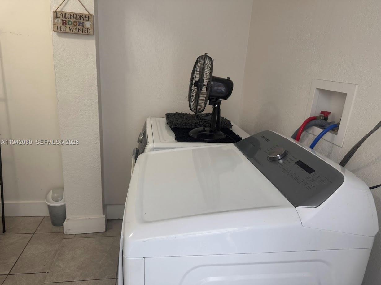412 West 15th Street Hialeah, FL 33010 - Photo 39 of 49 a utility room with dryer and washer