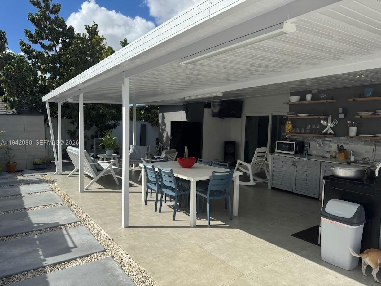 412 West 15th Street Hialeah, FL 33010 - Photo 45 of 48 a view of a dining room with furniture