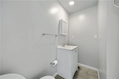 a bathroom with a sink a toilet