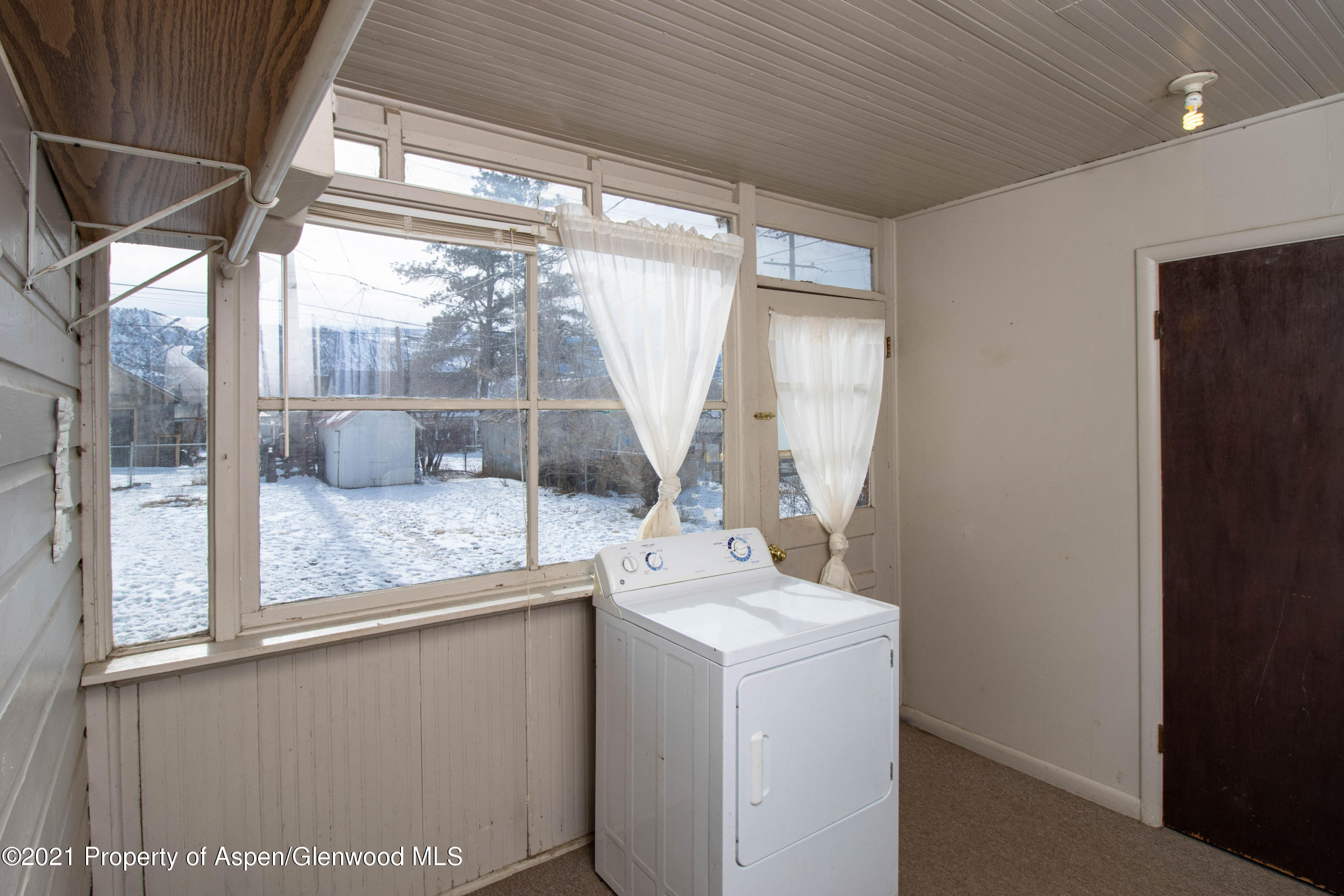 211 East 2nd Street Rifle, CO 81650 - Photo 10 of 15 a room with storage and utility