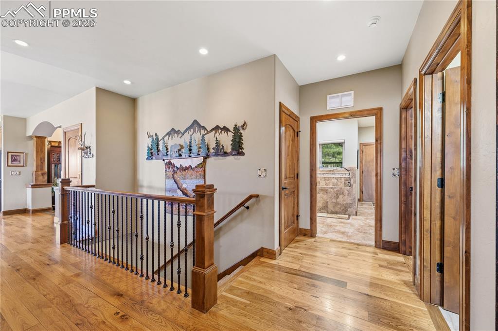 18890 Wing Tip Road Colorado Springs, CO 80908 - Photo 15 of 48 a view of a hallway view with staircase