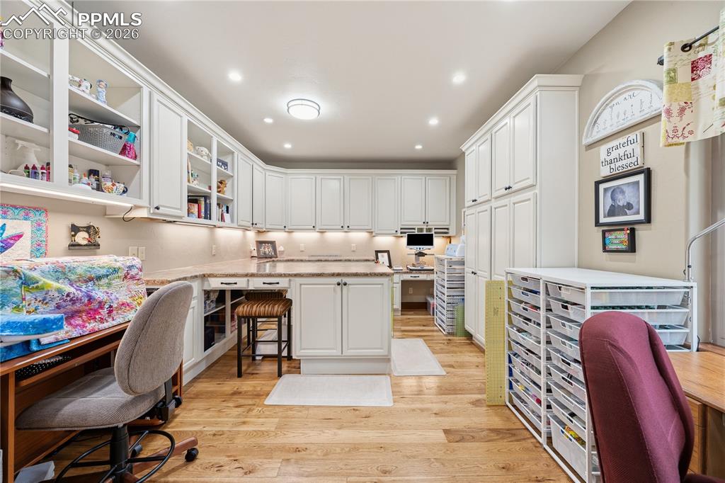 18890 Wing Tip Road Colorado Springs, CO 80908 - Photo 21 of 48 a kitchen with furniture a refrigerator and a stove