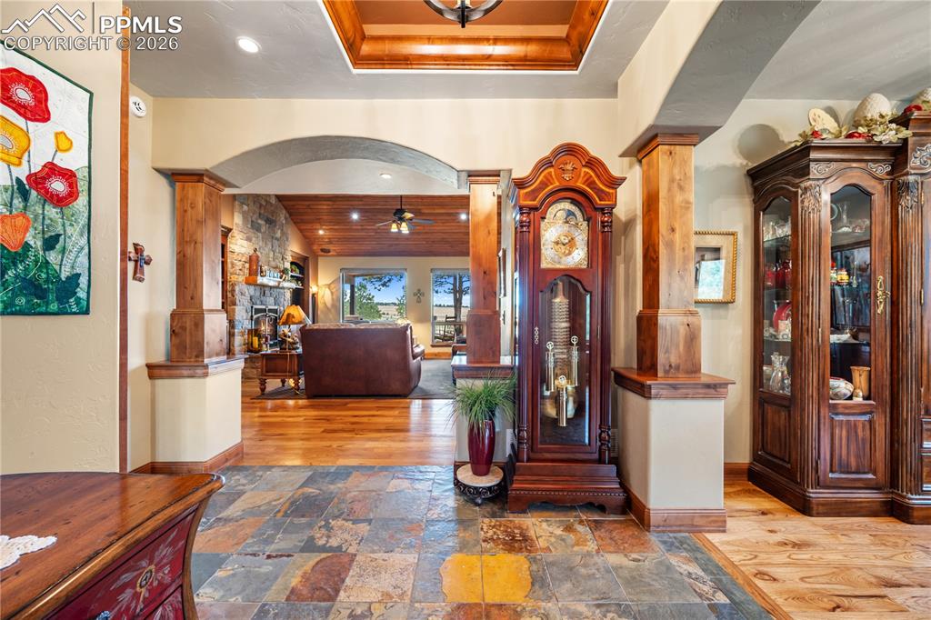 18890 Wing Tip Road Colorado Springs, CO 80908 - Photo 4 of 48 a view of an entryway with a chandelier
