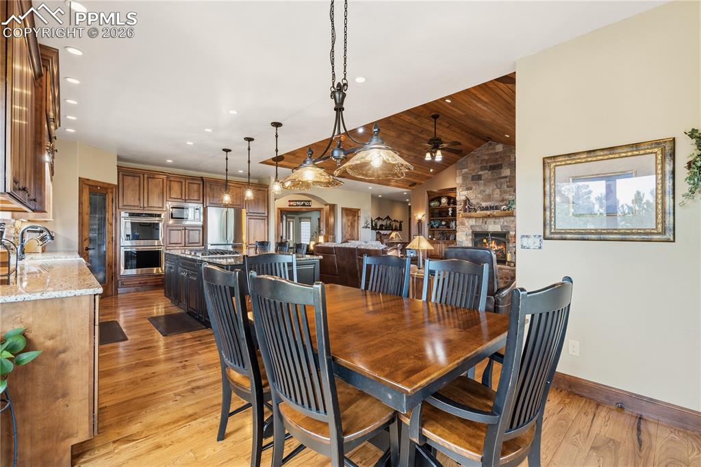 18890 Wing Tip Road Colorado Springs, CO 80908 - Photo 8 of 48 a view of a dining room with furniture