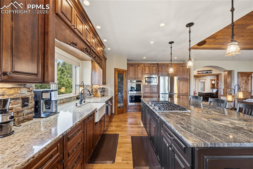 18890 Wing Tip Road Colorado Springs, CO 80908 - Photo 10 of 48 a kitchen with lots of counter top space
