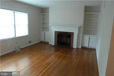 6735 Towne Lane Road McLean, VA 22101 - Photo 11 of 24 a view of empty room with a fireplace