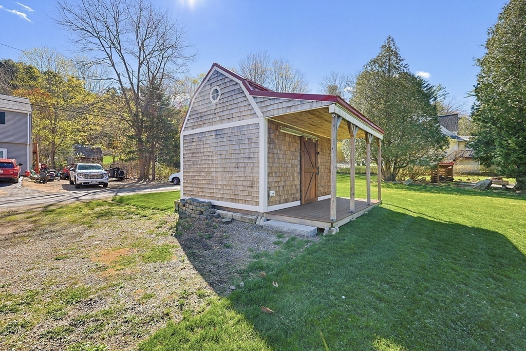 44 Clark Street Spencer, MA 01562 - Photo 29 of 41 a view of a house with a yard