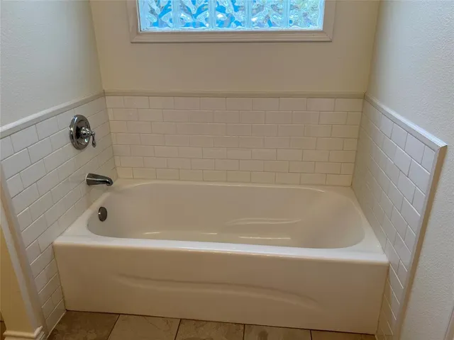 a bathroom with a bathtub