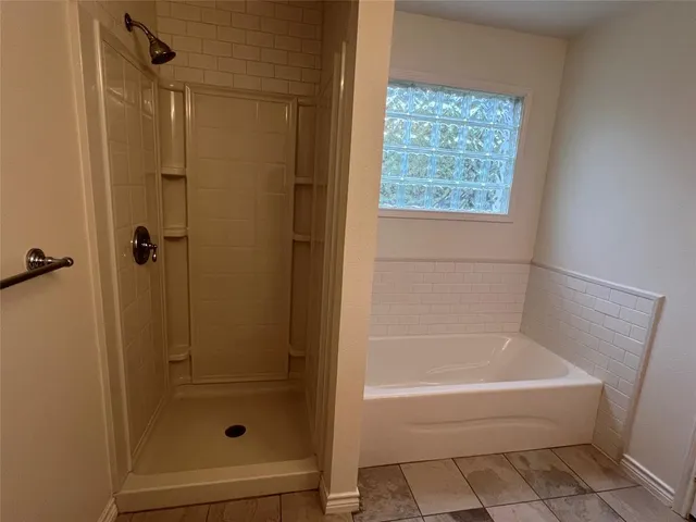 a bathroom with a bathtub