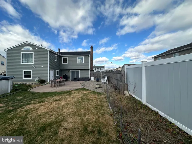 a room with furniture and a wooden floor