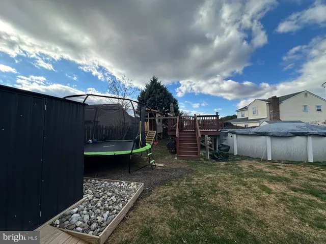 a view of a living room and entryway