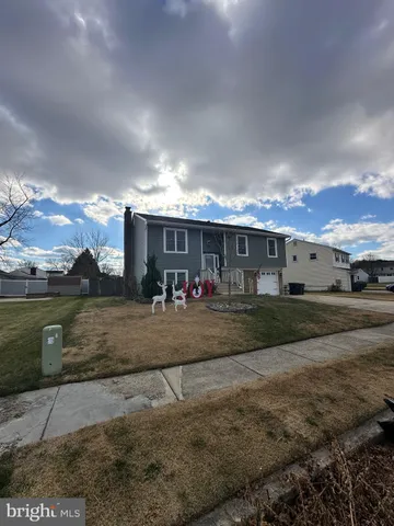 a hallway with wooden floor