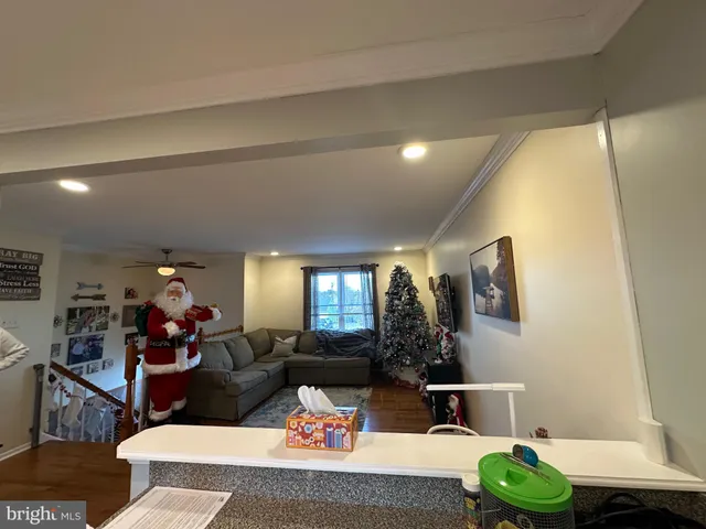 a dining room with a wooden table and a chair