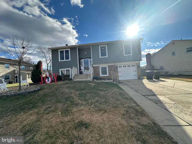 a view of a yard with table and chairs