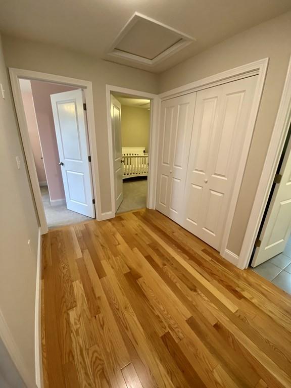 84 Old Pasture Road Dracut, MA 01826 - Photo 14 of 37 a bedroom with a bed and a mirror