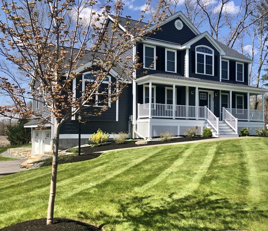 84 Old Pasture Road Dracut, MA 01826 - Photo 2 of 37 a front view of a house with a yard