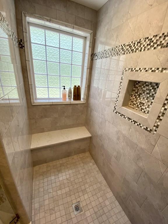 84 Old Pasture Road Dracut, MA 01826 - Photo 22 of 37 a bathroom with a window bathtub and window