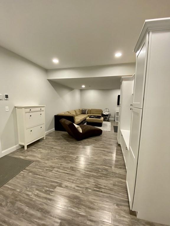 84 Old Pasture Road Dracut, MA 01826 - Photo 25 of 37 a living room with furniture and a mirror
