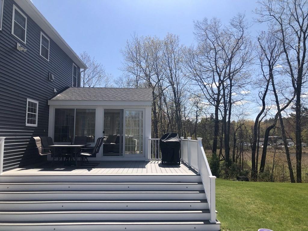 84 Old Pasture Road Dracut, MA 01826 - Photo 30 of 37 a front view of a house with a yard
