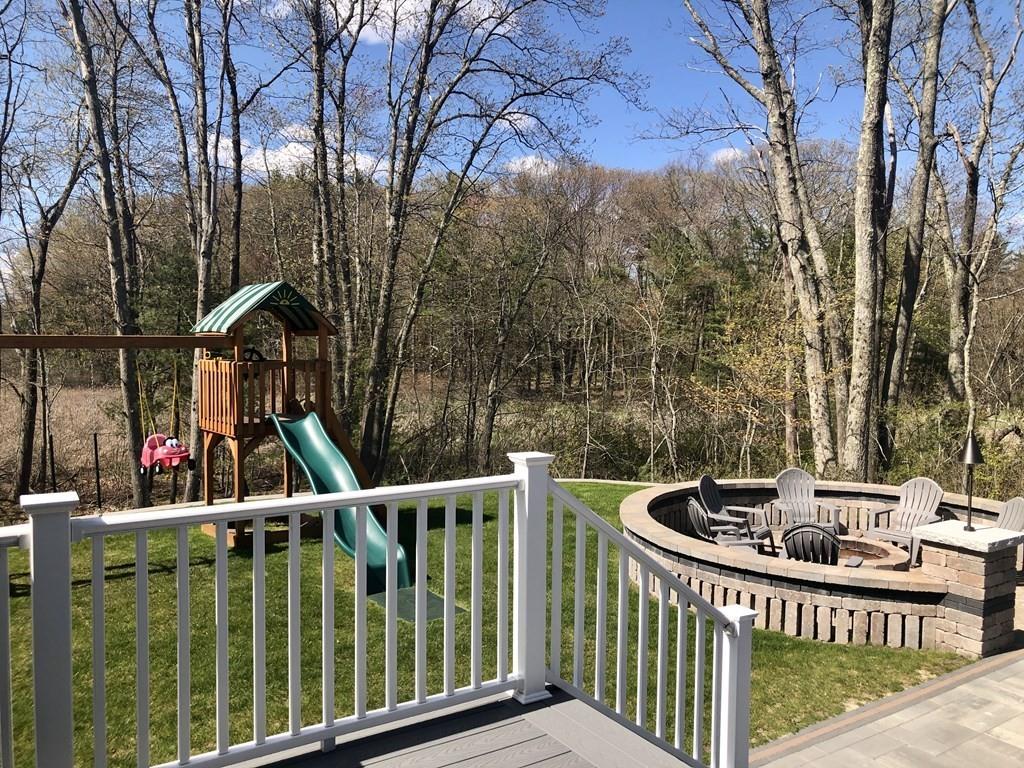 84 Old Pasture Road Dracut, MA 01826 - Photo 33 of 37 a view of a two chairs and table in the balcony