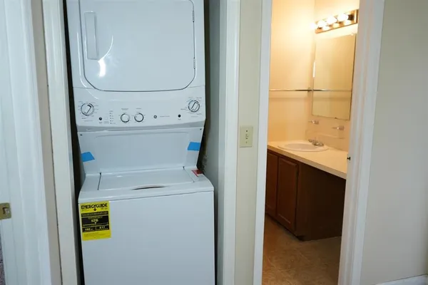 a view of a hallway with closet