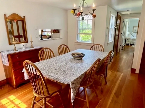 a view of a dining room and livingroom with furniture