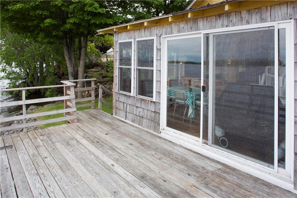 115 Luckys Landing Road Glenburn, ME 04401 - Photo 7 of 24 Deck has slider to enclosed porch