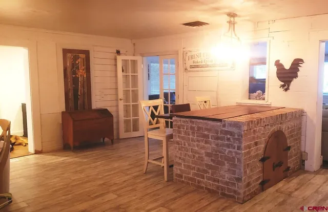 a bed room with a bed and furniture