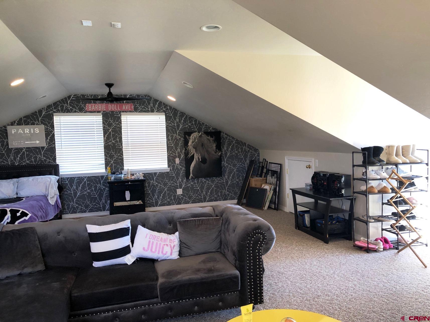 28236 Road H Cortez, CO 81321 - Photo 5 of 37 a living room with furniture and a mirror