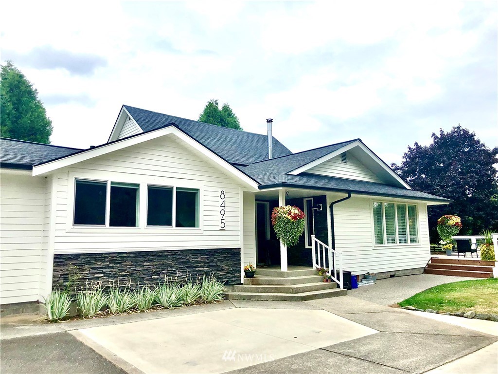 8495 Double Ditch Road Lynden, WA 98264 - Photo 1 of 1 a front view of a house with a yard