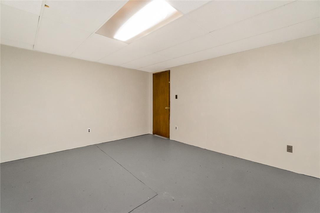 5728 Pheasant Road Bethlehem, PA 18017 - Photo 35 of 39 A versatile unfinished basement room provides smooth painted floors and overhead fluorescent lighting.