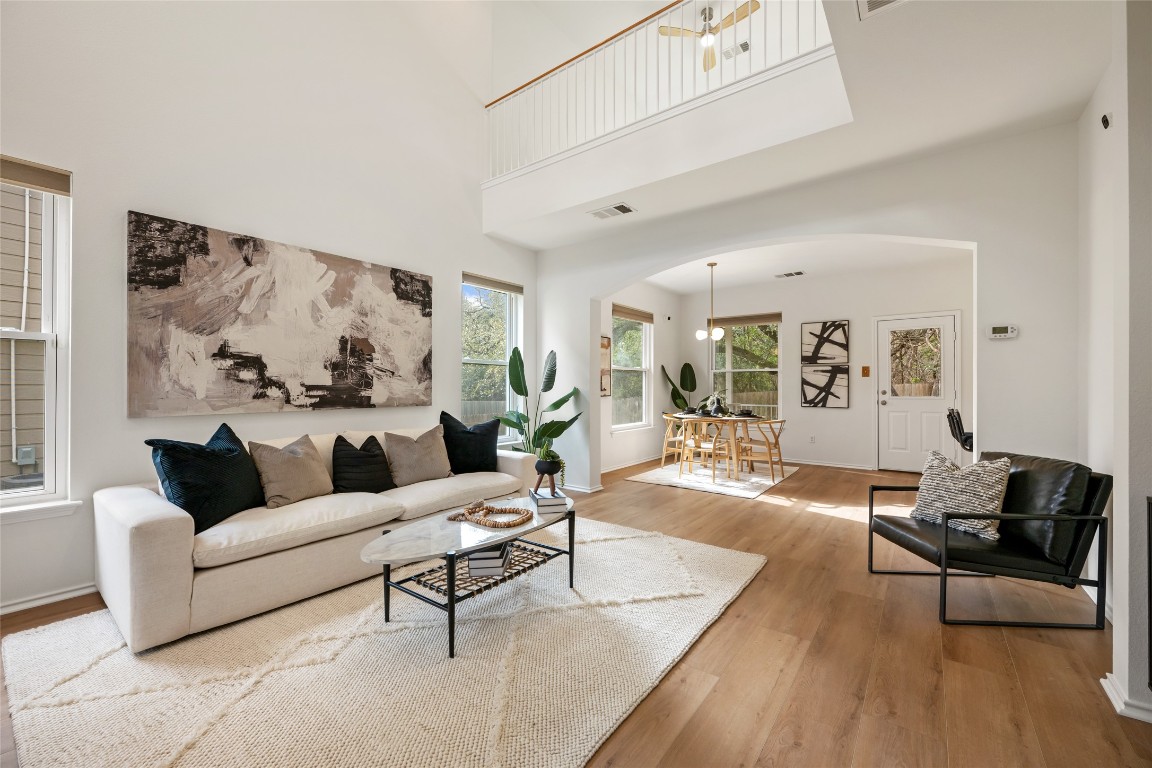 8615 Dulcet Drive Austin, TX 78745 - Photo 1 of 1 a living room with furniture and wooden floor