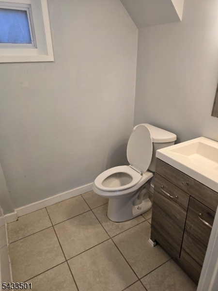 16 Musconetcong River Road, Unit 2 Hampton, NJ 08827 - Photo 6 of 12 a white toilet sitting next to a bathroom sink