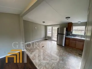 a view of a kitchen with a sink