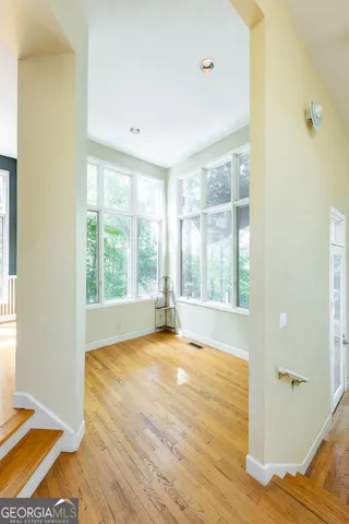 a bathroom with a sink vanity and a mirror