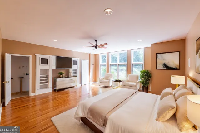 a view of a house with a yard and tree s