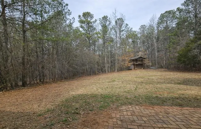 a view of empty room with trees