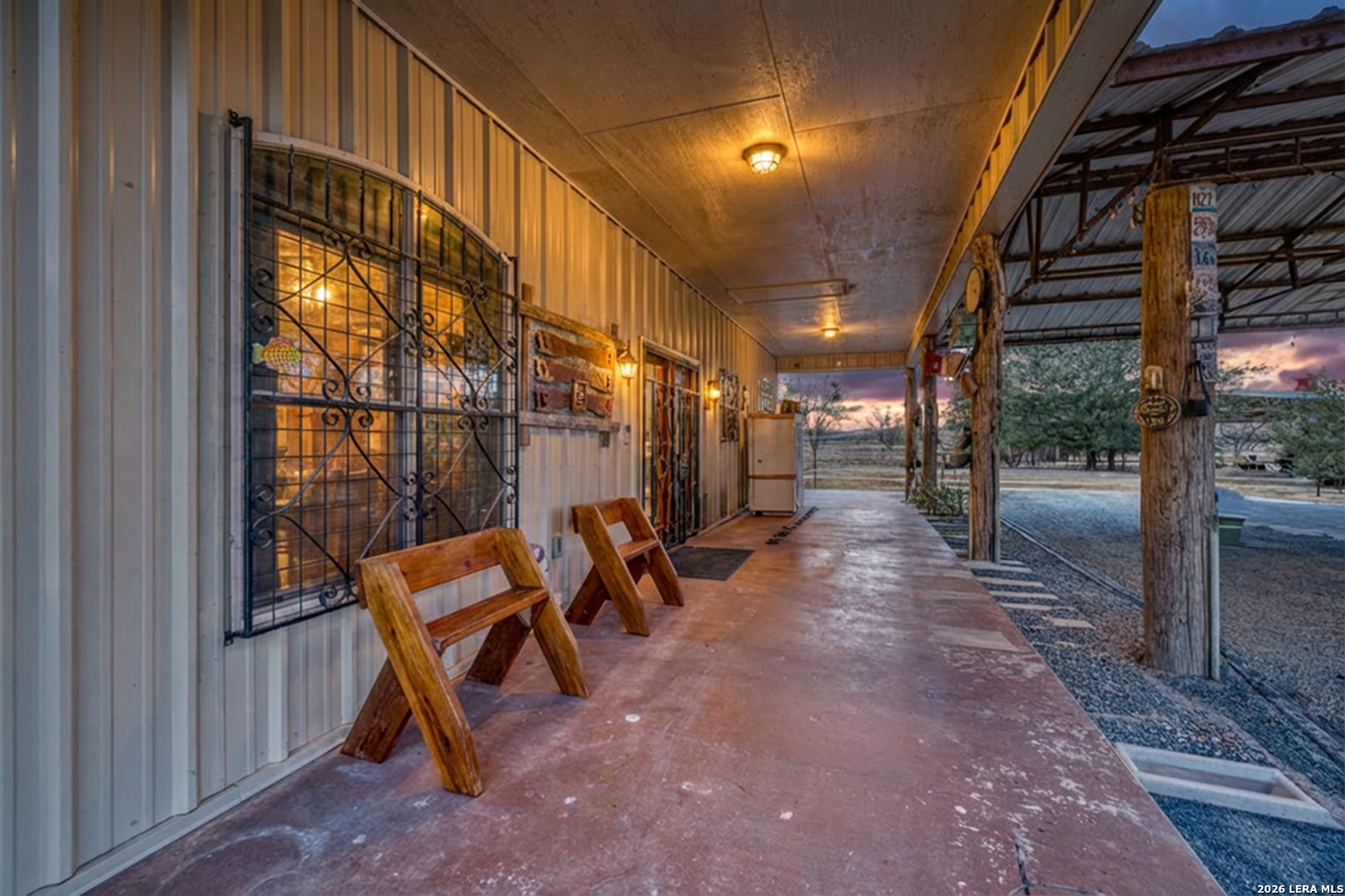 1140 Curtis Bourne Road Crystal City, TX 78839 - Photo 17 of 54 a view of a porch with a table and chairs