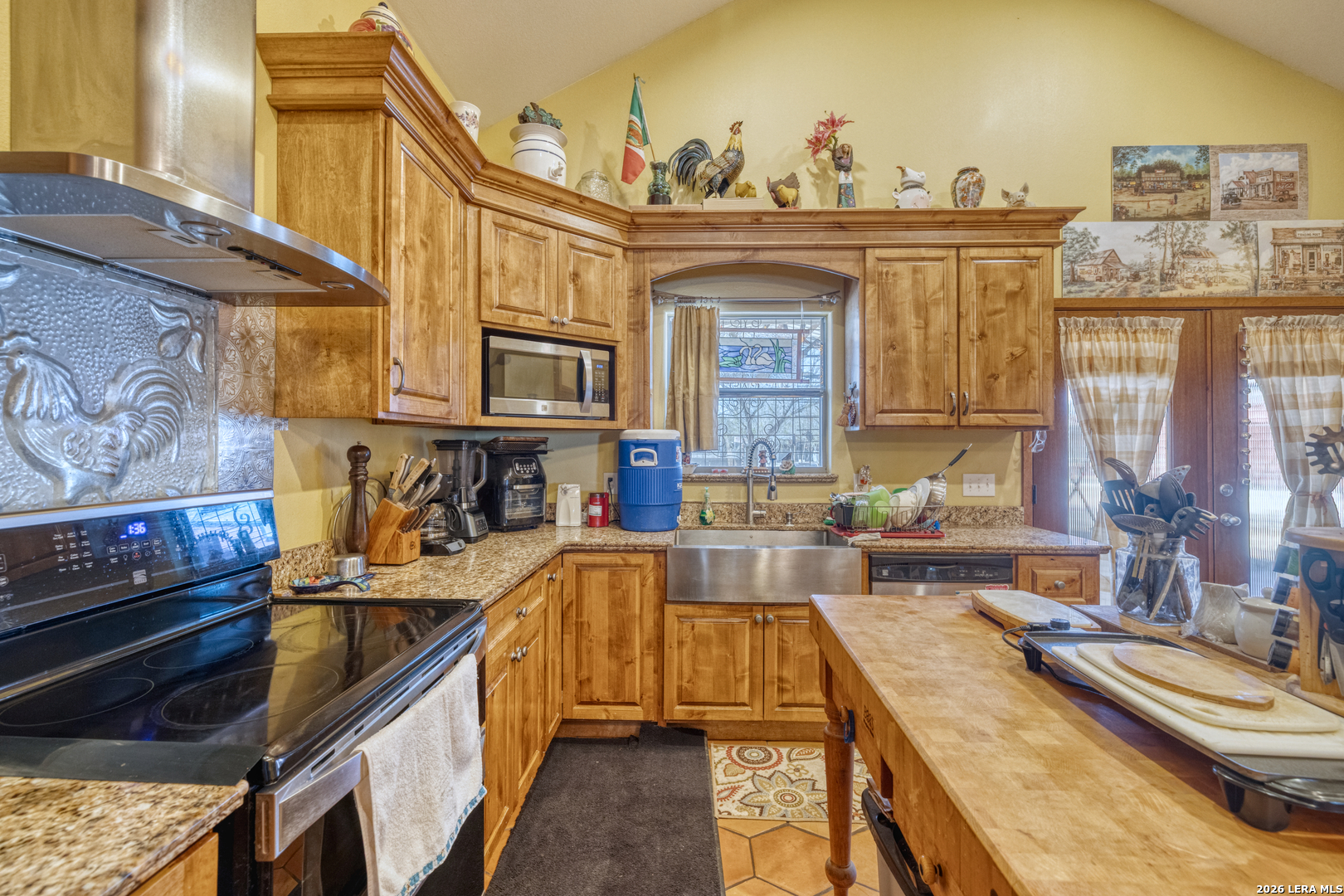 1140 Curtis Bourne Road Crystal City, TX 78839 - Photo 20 of 54 a large kitchen with stainless steel appliances granite countertop a stove and a sink