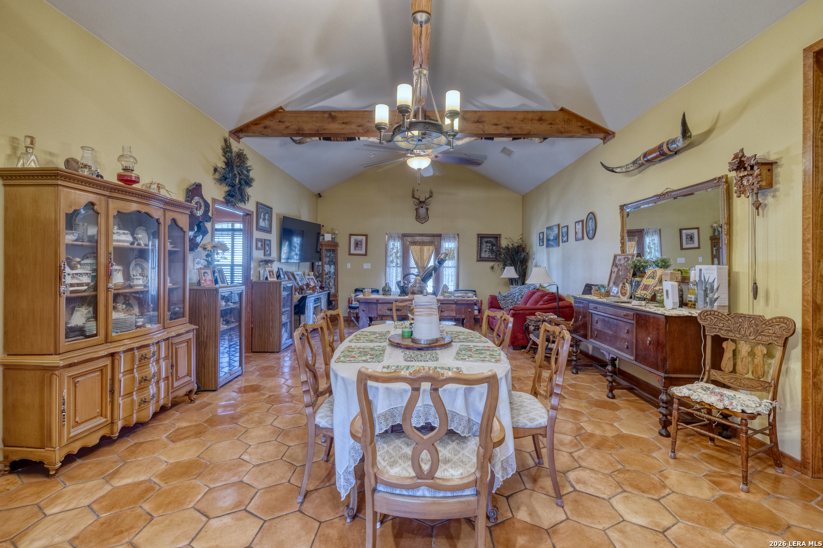 1140 Curtis Bourne Road Crystal City, TX 78839 - Photo 23 of 54 a view of a dining room with furniture a chandelier and window