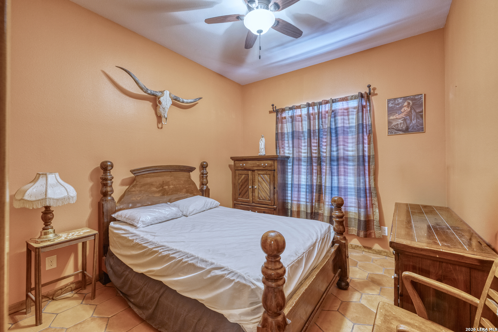 1140 Curtis Bourne Road Crystal City, TX 78839 - Photo 26 of 54 a bedroom with a bed and wooden floor