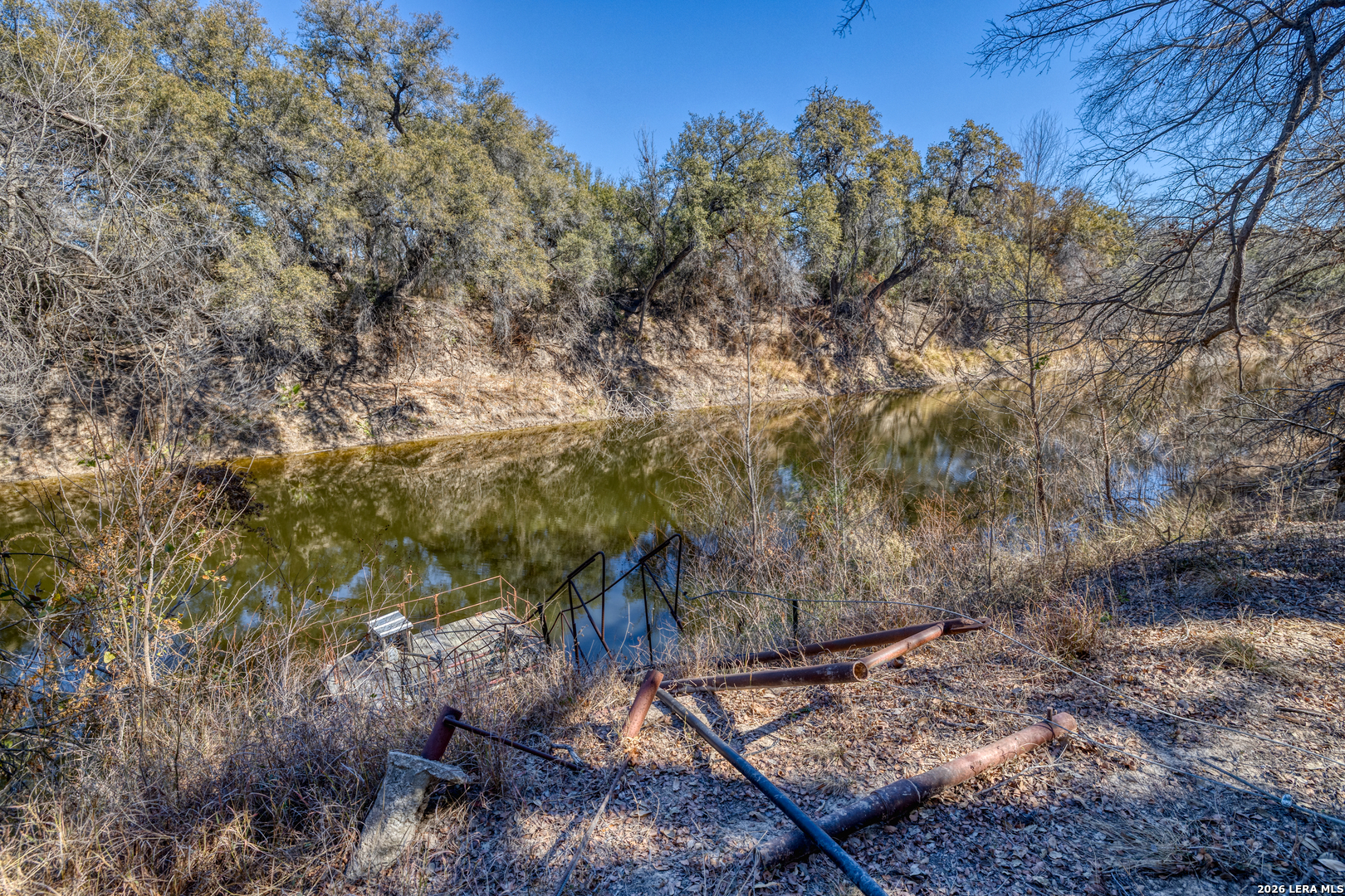 1140 Curtis Bourne Road Crystal City, TX 78839 - Photo 33 of 54 a view of a yard with wooden fence