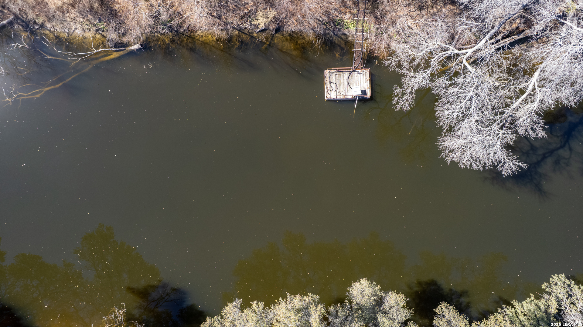 1140 Curtis Bourne Road Crystal City, TX 78839 - Photo 43 of 54 an aerial view of a house with a yard and lake view