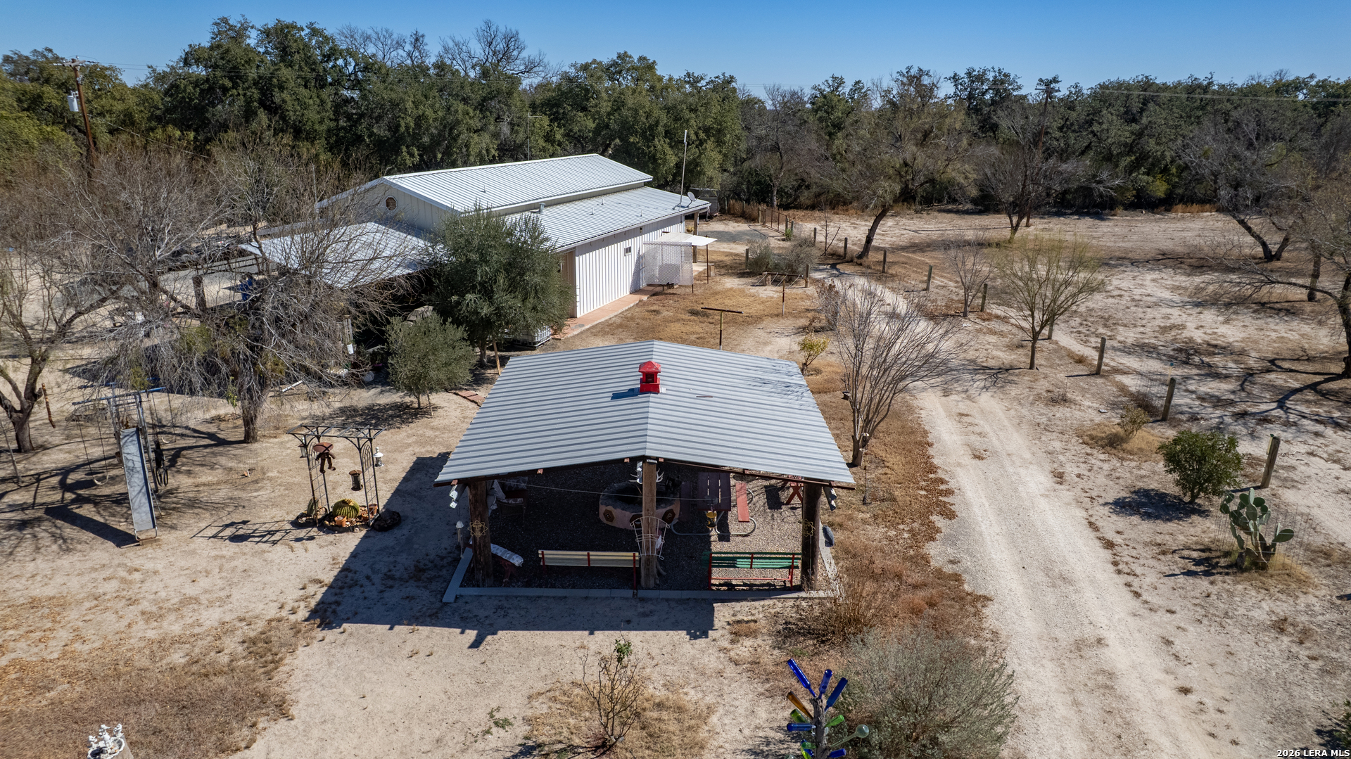 1140 Curtis Bourne Road Crystal City, TX 78839 - Photo 47 of 54 a view of a terrace with a yard