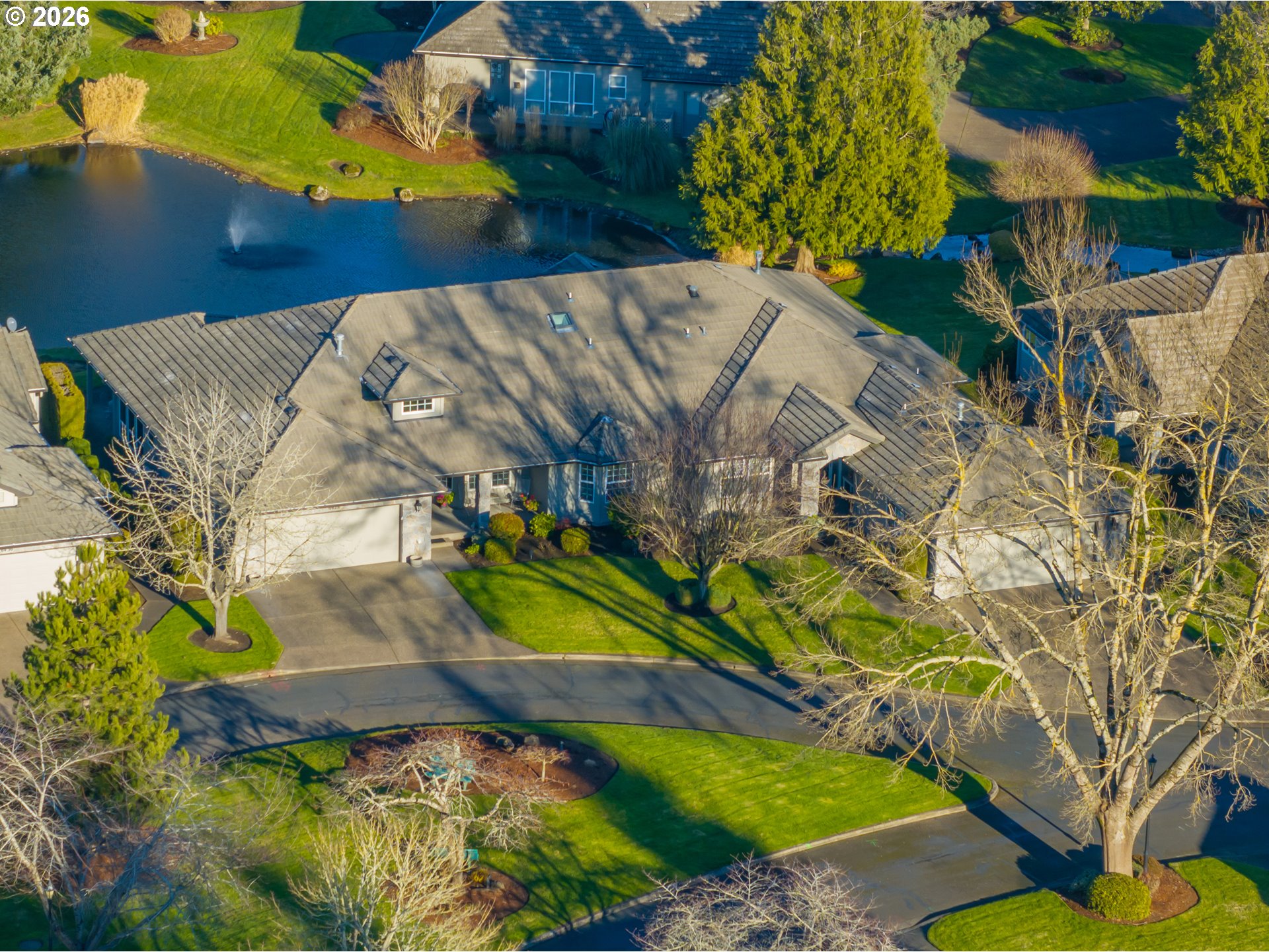a view of a swimming pool with a yard